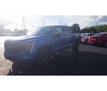 2021 Ford F-150 XLT is a Blue 2021 Ford F-150 XLT Car for Sale in Taylorville IL