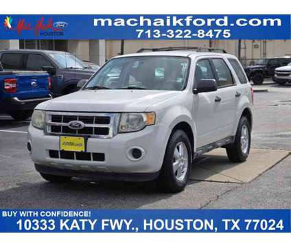 2012 Ford Escape Xls is a White 2012 Ford Escape XLS Car for Sale in Houston TX