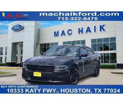 2018 Dodge Charger Sxt is a Black 2018 Dodge Charger SXT Car for Sale in Houston TX