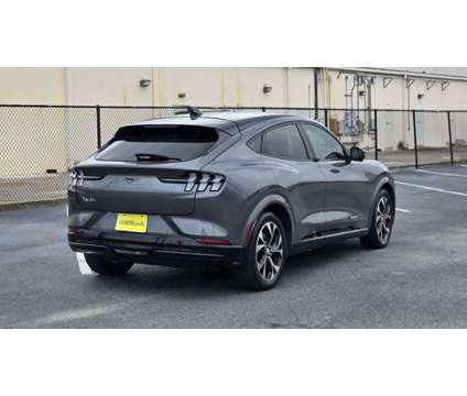 2021 Ford Mustang Mach-E Premium is a Grey 2021 Ford Mustang Car for Sale in Houston TX