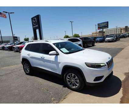 2019 Jeep Cherokee Latitude Plus is a White 2019 Jeep Cherokee Latitude Car for Sale in Lubbock TX