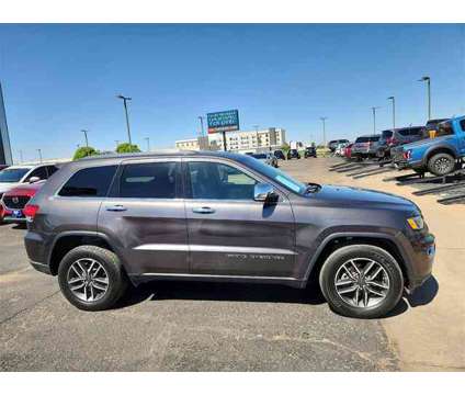 2020 Jeep Grand Cherokee Limited is a Grey 2020 Jeep grand cherokee Limited Car for Sale in Lubbock TX