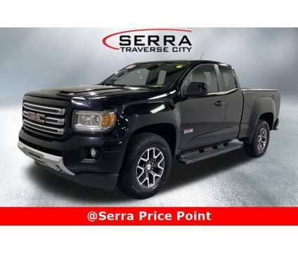 2015 GMC Canyon 4WD SLE is a Black 2015 GMC Canyon Car for Sale in Traverse City MI