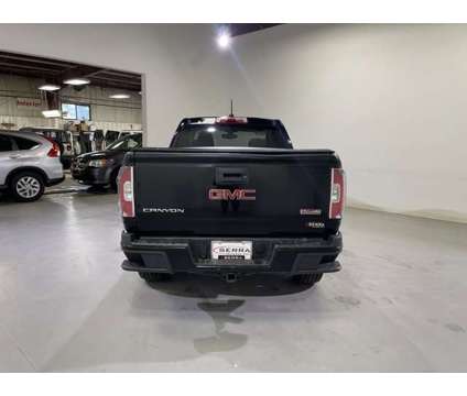 2015 GMC Canyon 4WD SLE is a Black 2015 GMC Canyon Car for Sale in Traverse City MI