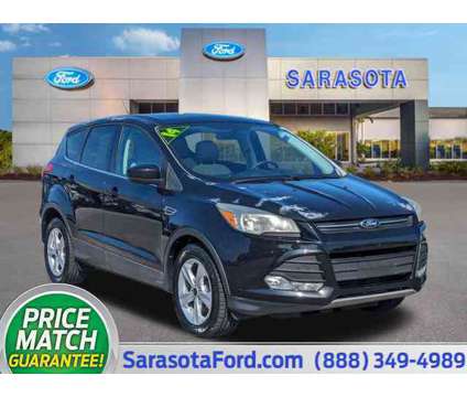 2014 Ford Escape SE is a Black 2014 Ford Escape SE Car for Sale in Sarasota FL