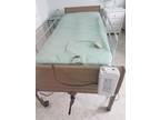 Hospital bed..Twin size. Includes rails and mattress. All Electric.
