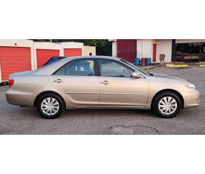 2005 Toyota Camry for sale is a Gold 2005 Toyota Camry Car for Sale in Tampa FL