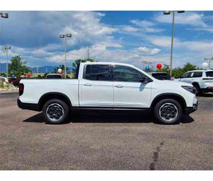 2024 Honda Ridgeline Black Edition is a Silver, White 2024 Honda Ridgeline Black Edition Truck in Colorado Springs CO