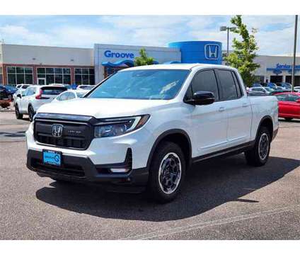 2024 Honda Ridgeline Black Edition is a Silver, White 2024 Honda Ridgeline Black Edition Truck in Colorado Springs CO