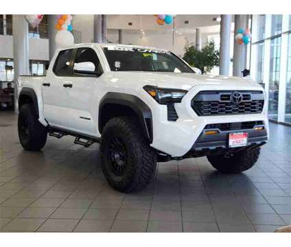 2024 Toyota Tacoma TRD Off-Road is a Silver 2024 Toyota Tacoma TRD Off Road Truck in Katy TX