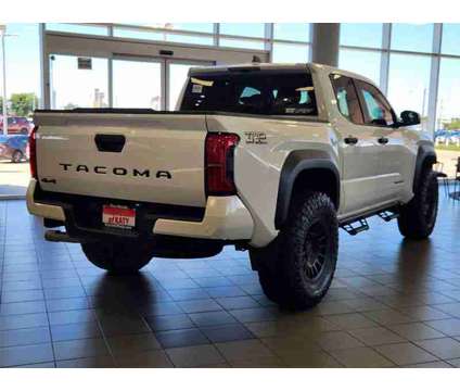 2024 Toyota Tacoma TRD Off-Road is a Silver 2024 Toyota Tacoma TRD Off Road Truck in Katy TX