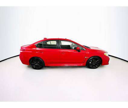 2021 Subaru WRX Premium is a Red 2021 Subaru WRX Premium Sedan in Madison WI