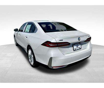 2024 BMW 5 Series i xDrive is a White 2024 BMW 5-Series Sedan in Huntington Station NY