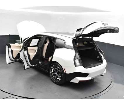 2025 BMW iX xDrive50 is a White 2025 BMW 325 Model iX SUV in Jackson MS