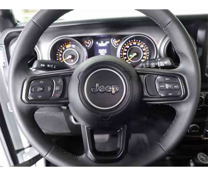 2023 Jeep Wrangler Sport S 4WD is a White 2023 Jeep Wrangler Sport SUV in Edmond OK