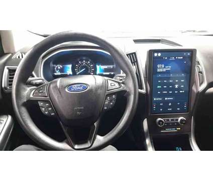 2021 Ford Edge SE is a Silver 2021 Ford Edge SE SUV in Wisconsin Rapids WI