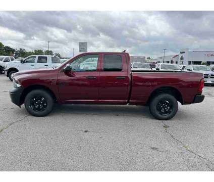 2024 Ram 1500 Classic Tradesman is a Red 2024 RAM 1500 Model Tradesman Truck in Fort Smith AR