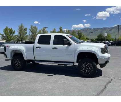 2014 GMC Sierra 2500HD SLE is a White 2014 GMC Sierra 2500 H/D Truck in Logan UT