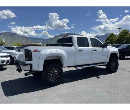 2014 GMC Sierra 2500HD SLE is a White 2014 GMC Sierra 2500 H/D Truck in Logan UT