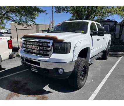 2014 GMC Sierra 2500HD SLE is a White 2014 GMC Sierra 2500 H/D Truck in Logan UT