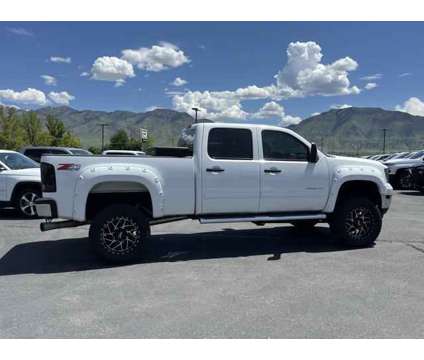 2014 GMC Sierra 2500HD SLE is a White 2014 GMC Sierra 2500 H/D Truck in Logan UT