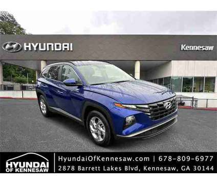 2022 Hyundai Tucson SEL is a Blue 2022 Hyundai Tucson SUV in Kennesaw GA