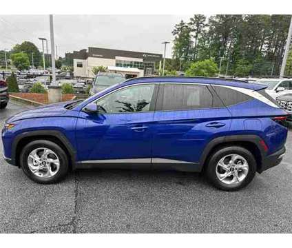 2022 Hyundai Tucson SEL is a Blue 2022 Hyundai Tucson SUV in Kennesaw GA