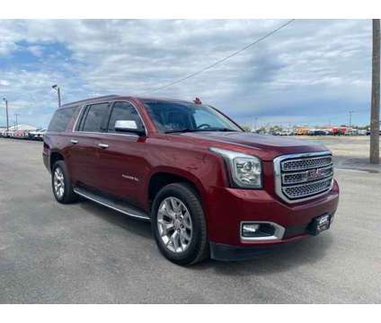 2018 GMC Yukon XL SLT is a Red 2018 GMC Yukon XL SLT SUV in Council Bluffs IA