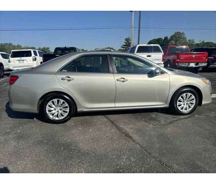 2013 Toyota Camry L is a Gold 2013 Toyota Camry L Sedan in Dubuque IA
