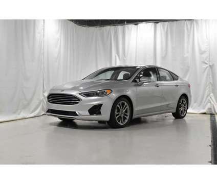 2020 Ford Fusion SEL is a Silver 2020 Ford Fusion SEL Sedan in Monroe MI