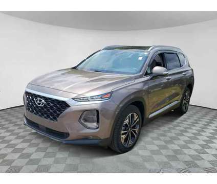 2019 Hyundai Santa Fe Limited 2.0T is a Tan 2019 Hyundai Santa Fe Limited SUV in Orlando FL