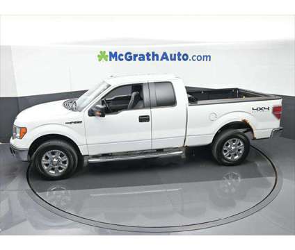 2011 Ford F-150 FX4 is a White 2011 Ford F-150 FX4 Truck in Dubuque IA