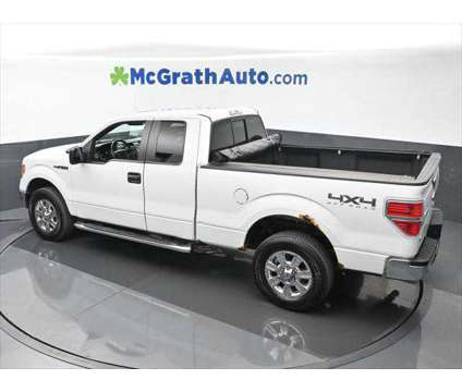 2011 Ford F-150 FX4 is a White 2011 Ford F-150 FX4 Truck in Dubuque IA