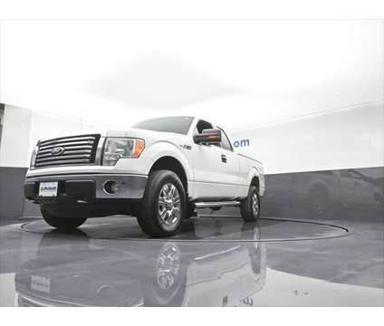 2011 Ford F-150 FX4 is a White 2011 Ford F-150 FX4 Truck in Dubuque IA