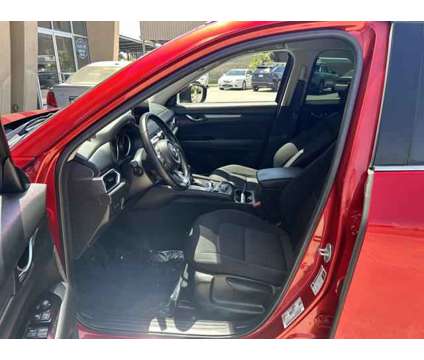 2021 Mazda CX-5 Sport is a Red 2021 Mazda CX-5 Sport SUV in Bakersfield CA