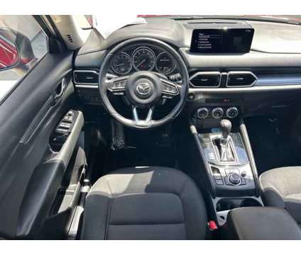 2021 Mazda CX-5 Sport is a Red 2021 Mazda CX-5 Sport SUV in Bakersfield CA