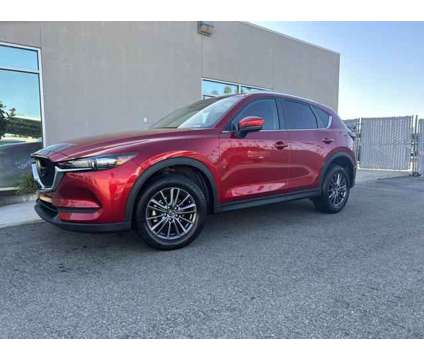 2021 Mazda CX-5 Sport is a Red 2021 Mazda CX-5 Sport SUV in Bakersfield CA