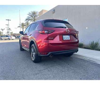 2021 Mazda CX-5 Sport is a Red 2021 Mazda CX-5 Sport SUV in Bakersfield CA