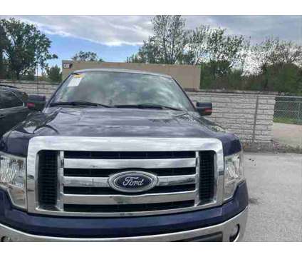 2011 Ford F-150 XLT is a Blue 2011 Ford F-150 XLT Truck in Dubuque IA