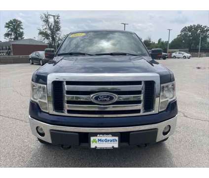 2011 Ford F-150 XLT is a Blue 2011 Ford F-150 XLT Truck in Dubuque IA
