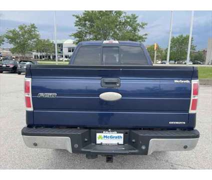 2011 Ford F-150 XLT is a Blue 2011 Ford F-150 XLT Truck in Dubuque IA