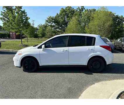 2009 Nissan Versa 1.8 S is a White 2009 Nissan Versa 1.8 S Car for Sale in Springfield VA