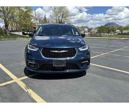 2022 Chrysler Pacifica Touring L is a Blue 2022 Chrysler Pacifica Touring Car for Sale in Salt Lake City UT