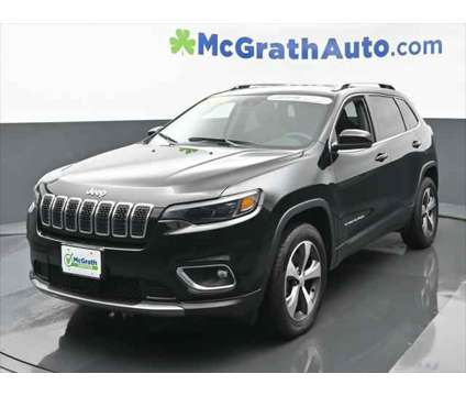 2021 Jeep Cherokee Limited 4X4 is a Black 2021 Jeep Cherokee Limited SUV in Dubuque IA