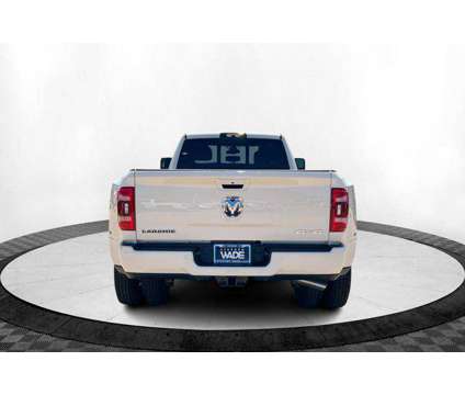 2024 Ram 3500 Laramie Crew Cab 4x4 8' Box is a White 2024 RAM 3500 Model Laramie Truck in Saint George UT