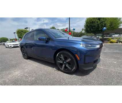 2025 BMW iX xDrive50 is a Blue 2025 BMW 325 Model iX SUV in Newport News VA