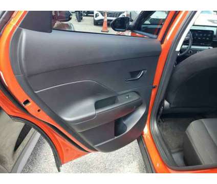 2024 Hyundai Kona SE is a Orange 2024 Hyundai Kona SE SUV in Orlando FL