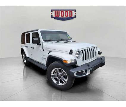 2020 Jeep Wrangler Unlimited Sahara is a White 2020 Jeep Wrangler Unlimited Sahara SUV in Harrison AR