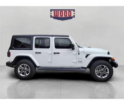 2020 Jeep Wrangler Unlimited Sahara is a White 2020 Jeep Wrangler Unlimited Sahara SUV in Harrison AR