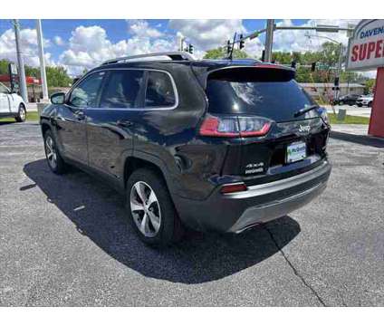 2021 Jeep Cherokee Limited 4X4 is a Black 2021 Jeep Cherokee Limited SUV in Dubuque IA